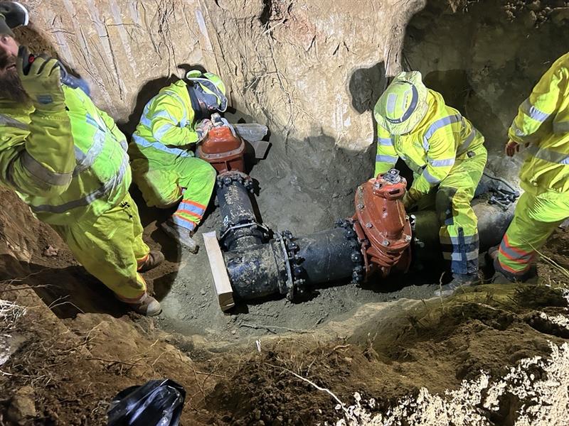 workers making upgrades to underground water pipelines