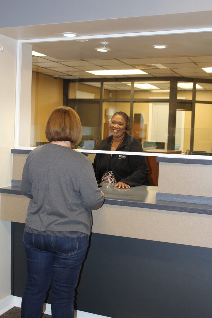 Two women discussing billing