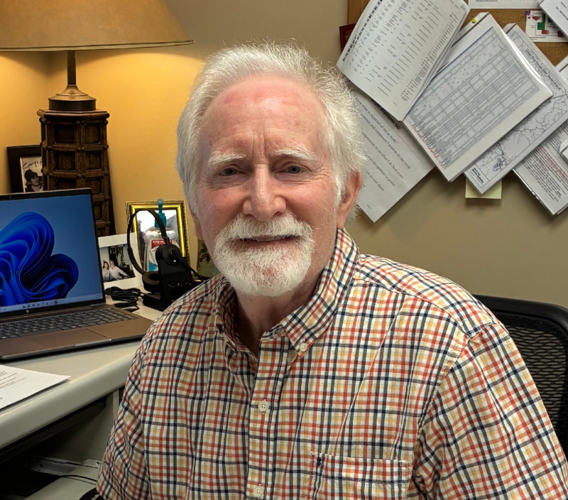 Tim Brown at desk